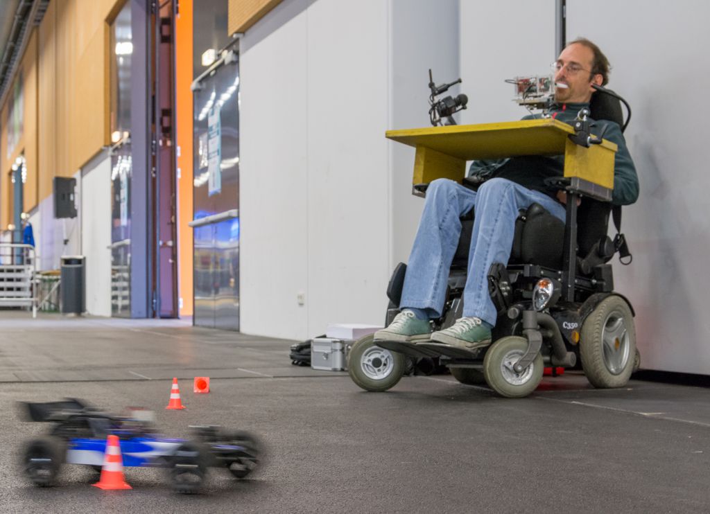 Photo: Gerhard controls a Remote Controlled Car with the 4D-Joystick